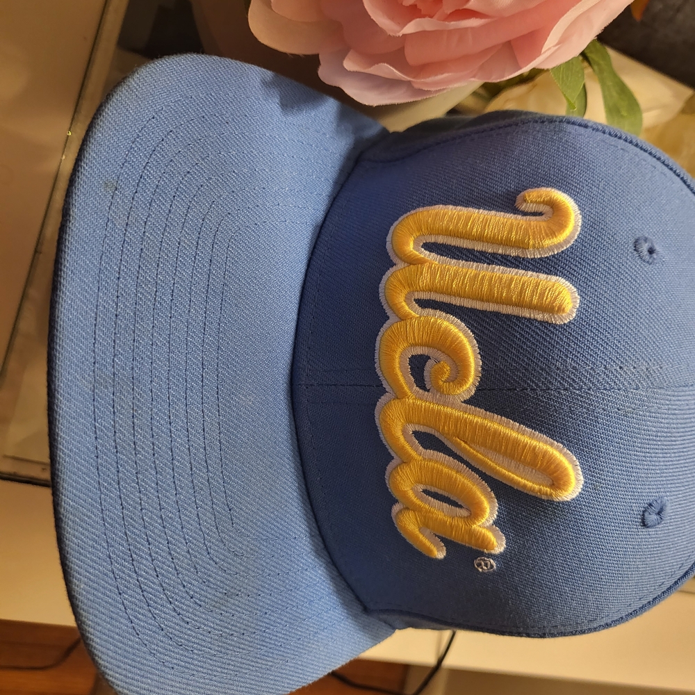 New Era Kids Light Blue Baseball Cap with Yellow Script Logo